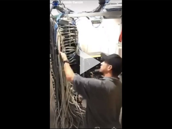 UITS tech connecting cables to new switches