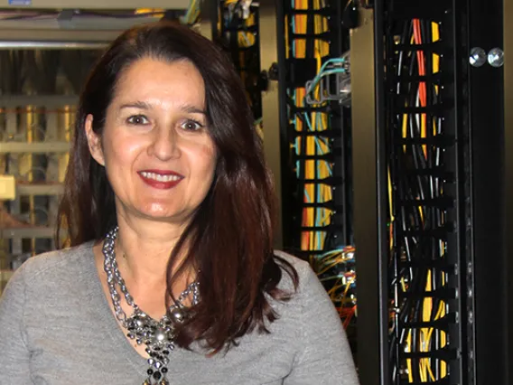 Dragana Vasic, Assistant Director Communications Infrastructure Development, shows new network equipment