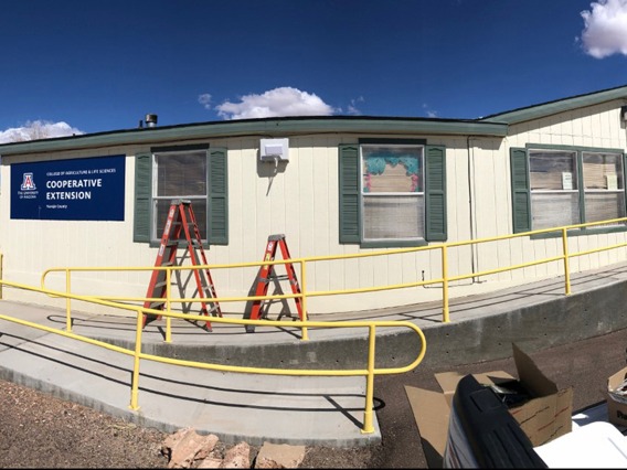 A wireless access point is added outside the Navajo County Cooperative Extension office in Holbrook