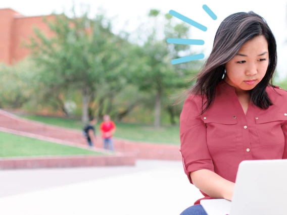 What's New in Tech - Student looking at Laptop