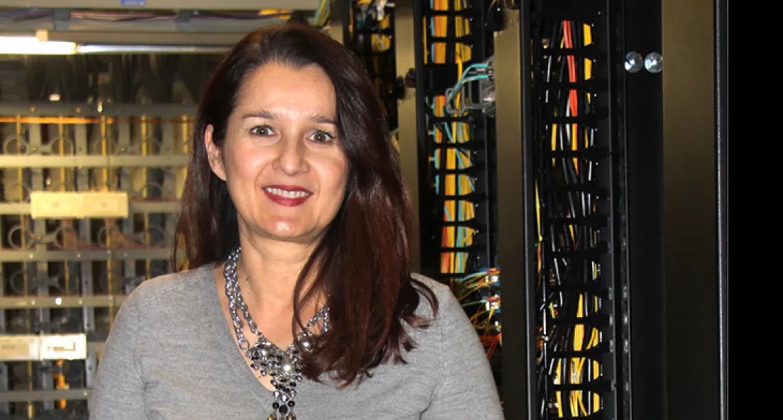 Dragana Vasic, Assistant Director Communications Infrastructure Development, shows new network equipment