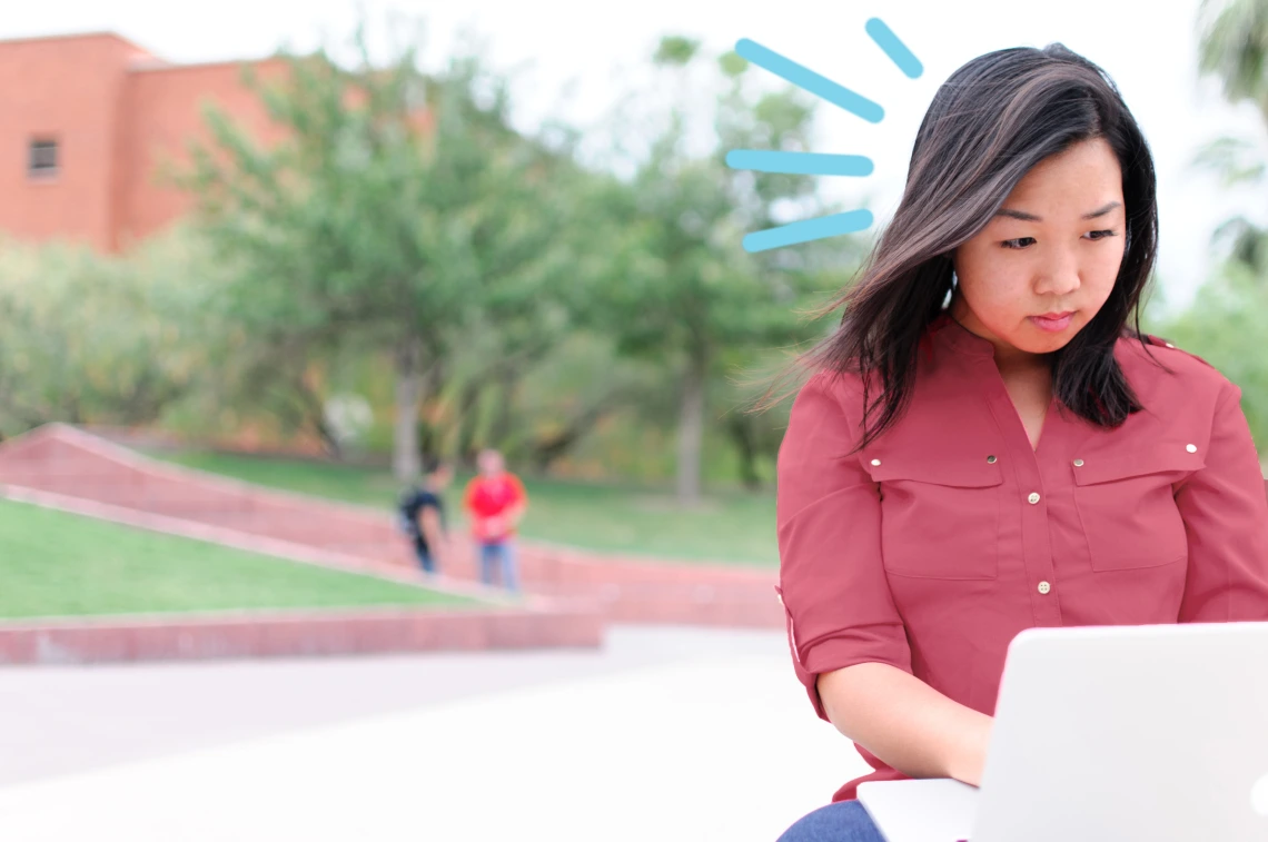 What's New in Tech - Student looking at Laptop