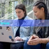 Students Looking at Laptop