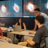 Students reviewing Data Visualization graphics